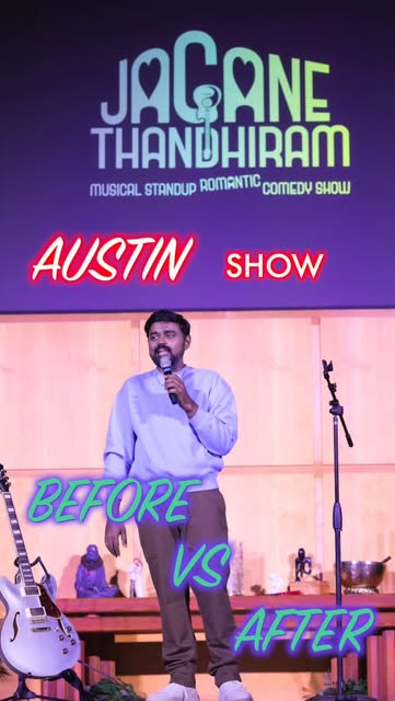 Jagan performing on stage with a microphone and guitars behind him at the Austin show